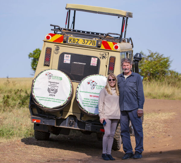 Kubwa Five Safaris 4x4 vehicle on a game drive during a golden savanna sunset in East Africa